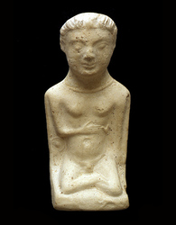 Figurine représentant un dieu accroupi dit de 'Quilly'